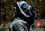 Standbild Schutz gegen Nerv agent Spray attack United States USA, 1968, aus Sekunde 28 historischem Filmmaterial Videoclip 65675025477