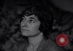 Image of Madeleine Poirier prays Paris France, 1935, second 49 stock footage video 65675025485