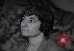 Image of Madeleine Poirier prays Paris France, 1935, second 51 stock footage video 65675025485