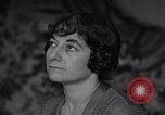 Image of Madeleine Poirier prays Paris France, 1935, second 52 stock footage video 65675025485