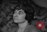 Image of Madeleine Poirier prays Paris France, 1935, second 53 stock footage video 65675025485