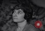 Image of Madeleine Poirier prays Paris France, 1935, second 54 stock footage video 65675025485