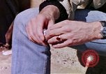 Image of hoodlums mugging man  United States USA, 1974, second 1 stock footage video 65675025490