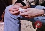Image of hoodlums mugging man  United States USA, 1974, second 5 stock footage video 65675025490