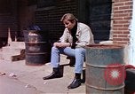 Image of hoodlums mugging man  United States USA, 1974, second 6 stock footage video 65675025490