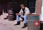 Image of hoodlums mugging man  United States USA, 1974, second 7 stock footage video 65675025490