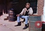 Image of hoodlums mugging man  United States USA, 1974, second 8 stock footage video 65675025490
