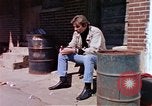 Image of hoodlums mugging man  United States USA, 1974, second 10 stock footage video 65675025490