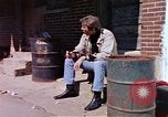 Image of hoodlums mugging man  United States USA, 1974, second 13 stock footage video 65675025490