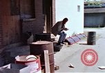 Image of hoodlums mugging man  United States USA, 1974, second 14 stock footage video 65675025490