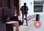 Image of hoodlums mugging man  United States USA, 1974, second 15 stock footage video 65675025490