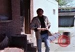 Image of hoodlums mugging man  United States USA, 1974, second 16 stock footage video 65675025490
