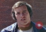 Image of hoodlums mugging man  United States USA, 1974, second 20 stock footage video 65675025490
