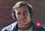 Image of hoodlums mugging man  United States USA, 1974, second 22 stock footage video 65675025490