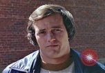 Image of hoodlums mugging man  United States USA, 1974, second 23 stock footage video 65675025490