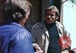Image of hoodlums mugging man  United States USA, 1974, second 24 stock footage video 65675025490
