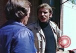 Image of hoodlums mugging man  United States USA, 1974, second 27 stock footage video 65675025490