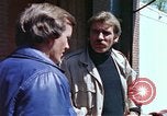 Image of hoodlums mugging man  United States USA, 1974, second 29 stock footage video 65675025490