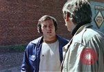 Image of hoodlums mugging man  United States USA, 1974, second 31 stock footage video 65675025490