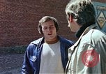 Image of hoodlums mugging man  United States USA, 1974, second 32 stock footage video 65675025490