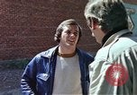 Image of hoodlums mugging man  United States USA, 1974, second 34 stock footage video 65675025490