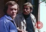 Image of hoodlums mugging man  United States USA, 1974, second 40 stock footage video 65675025490
