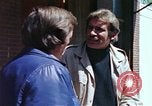 Image of hoodlums mugging man  United States USA, 1974, second 42 stock footage video 65675025490