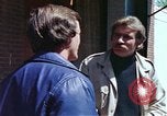 Image of hoodlums mugging man  United States USA, 1974, second 45 stock footage video 65675025490