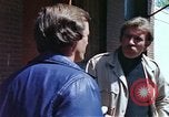 Image of hoodlums mugging man  United States USA, 1974, second 46 stock footage video 65675025490