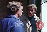 Image of hoodlums mugging man  United States USA, 1974, second 47 stock footage video 65675025490