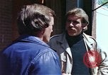 Image of hoodlums mugging man  United States USA, 1974, second 48 stock footage video 65675025490