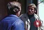 Image of hoodlums mugging man  United States USA, 1974, second 49 stock footage video 65675025490