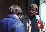 Image of hoodlums mugging man  United States USA, 1974, second 50 stock footage video 65675025490