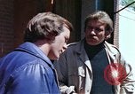 Image of hoodlums mugging man  United States USA, 1974, second 51 stock footage video 65675025490