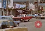 Standbild Verkehr auf der Straße Naha City Okinawa Japan, 1972, aus Sekunde 23 historischem Filmmaterial Videoclip 65675025525