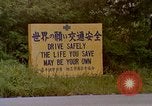 Standbild Verkehr auf der Straße Naha City Okinawa Japan, 1972, aus Sekunde 58 historischem Filmmaterial Videoclip 65675025525