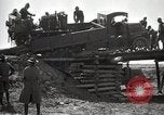 Immagine di Stati Uniti Convoglio esercito rompe il carrello attraverso il ponte di legno Wyoming United States USA, 1919, secondo 3 filmato di repertorio 65675025554