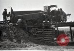 Immagine di Stati Uniti Convoglio esercito rompe il carrello attraverso il ponte di legno Wyoming United States USA, 1919, secondo 31 filmato di repertorio 65675025554