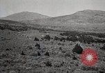 Image of Holt tractor pulling trucks through wet sand Nevada United States USA, 1919, second 29 stock footage video 65675025558