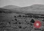 Image of Holt tractor pulling trucks through wet sand Nevada United States USA, 1919, second 30 stock footage video 65675025558