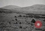 Image of Holt tractor pulling trucks through wet sand Nevada United States USA, 1919, second 31 stock footage video 65675025558