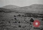 Image of Holt tractor pulling trucks through wet sand Nevada United States USA, 1919, second 32 stock footage video 65675025558