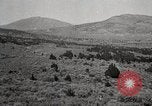 Image of Holt tractor pulling trucks through wet sand Nevada United States USA, 1919, second 33 stock footage video 65675025558