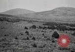Image of Holt tractor pulling trucks through wet sand Nevada United States USA, 1919, second 34 stock footage video 65675025558