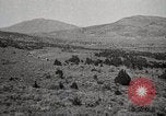 Image of Holt tractor pulling trucks through wet sand Nevada United States USA, 1919, second 35 stock footage video 65675025558