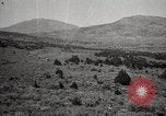 Image of Holt tractor pulling trucks through wet sand Nevada United States USA, 1919, second 36 stock footage video 65675025558