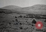 Image of Holt tractor pulling trucks through wet sand Nevada United States USA, 1919, second 37 stock footage video 65675025558