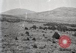 Image of Holt tractor pulling trucks through wet sand Nevada United States USA, 1919, second 38 stock footage video 65675025558
