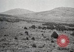 Image of Holt tractor pulling trucks through wet sand Nevada United States USA, 1919, second 39 stock footage video 65675025558