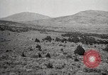 Image of Holt tractor pulling trucks through wet sand Nevada United States USA, 1919, second 40 stock footage video 65675025558